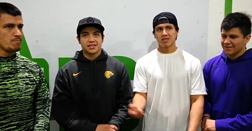 Iroquois lacrosse player brothers, Jeremy, Miles, Lyle, and Jerome "Hiana" Thompson.
