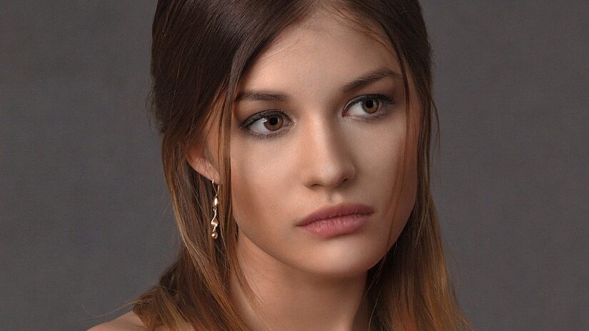 Portrait of a woman with a serious expression.