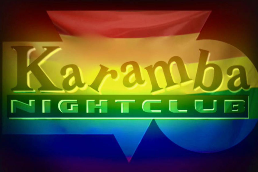 The rainbow-colored logo of Karamba Nightclub with bold yellow, red, green, and blue shapes on a dark background.